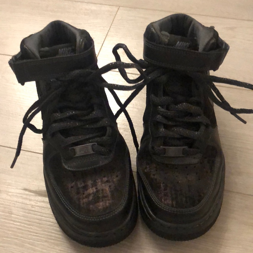 Black and dark glistening brown Air Force Ones